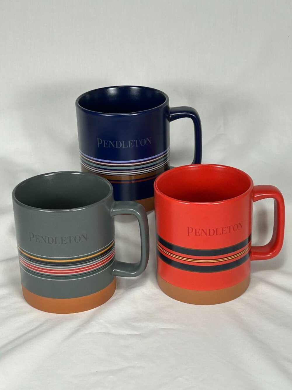 3 colorful Pendleton coffee mugs